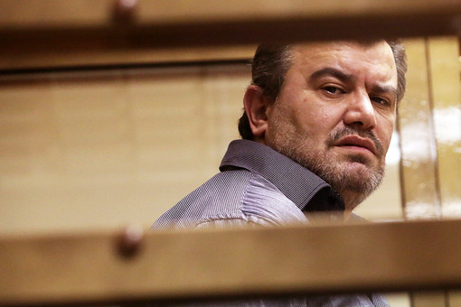Георгий Мартиросян, приговоренный к 23 годам колонии строгого режима за убийство трех моделей, во время оглашения приговора в Мосгорсуде. Фотография: ИТАР-ТАС